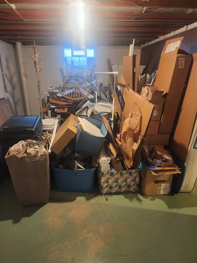 Roll-off dumpster container at job site for 8 Yard Dumpster Rental in Hermantown